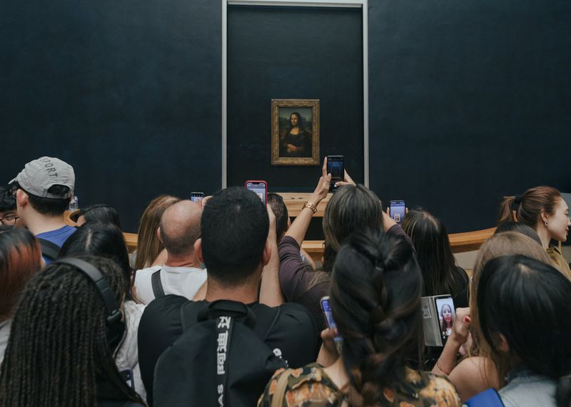 Mona Lisa at the Louvre, Paris: Tiny Painting, Massive Letdown
