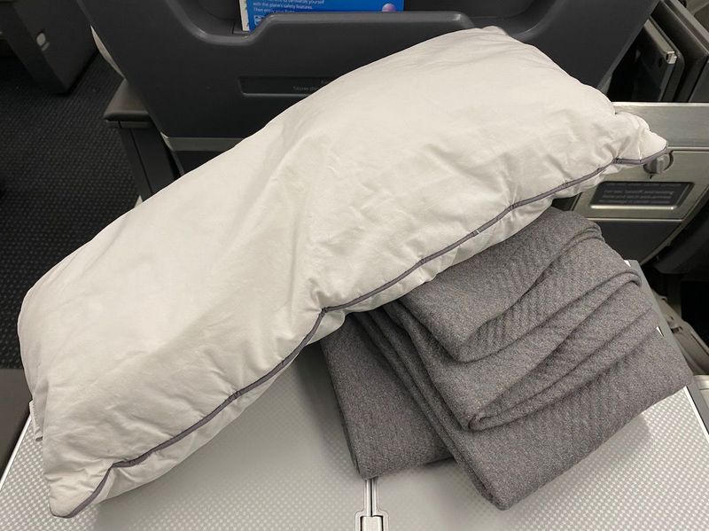 Relying on airplane blankets and pillows