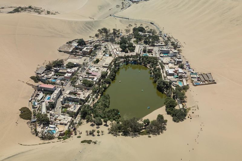 Huacachina, Peru - Desert Oasis Surrounded by Dunes