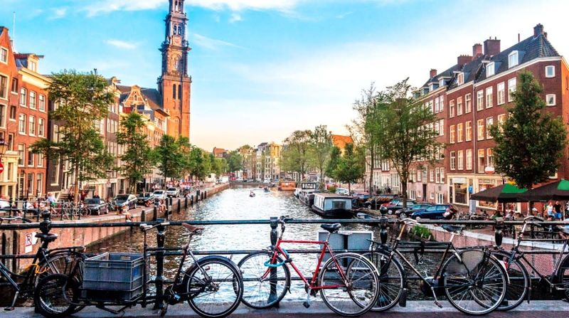 Amsterdam's Canal-Lined Streets Welcome First-Time Travelers